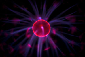 roter Lichtball mit schwarzem Hintergrund