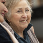 happy-senior-women-friends-chatting