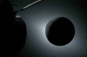 Die Orion-Kapsel fotografiert den Mond während einer Sonnenfinsternis: Am linken Rand spiegelt die Erde Licht, rechts sind Saturn und Mars als helle Punkte zu sehen.