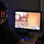In der höheren Risikogruppe berichteten 77,8 Prozent von finanziellen Folgen durch Gaming – bis hin zu Schulden und offenen Rechnungen. © Unsplash