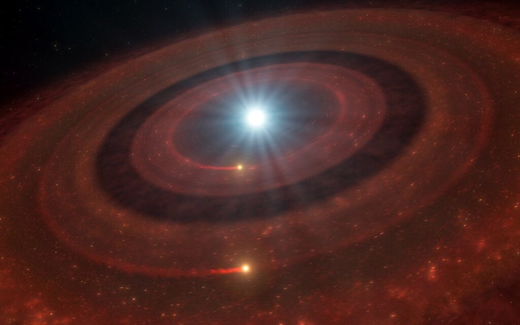 Zwei Ringe aus planetaren Trümmern umkreisen den ausgebrannten Stern J1328−1450. Möglicherweise haben größere Himmelskörper den Sternentod überlebt. © Illustration: ESO/L. Calçada